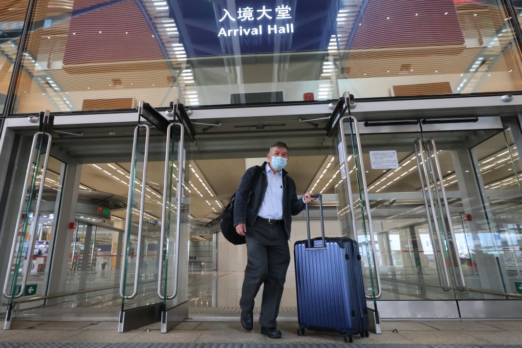 A traveller enters Hong Kong on December 7. Easily crossing borders and free movement of people might no longer be the norm as Hong Kong and the wider world adapt to the possibility of Covid-19 being around for the long term. Photo: Dickson Lee