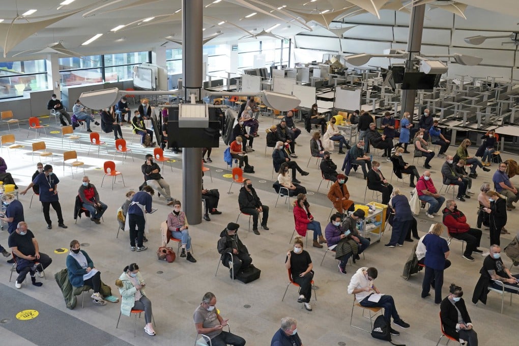 People wait to be vaccinated against Covid-19 in Ramsgate, Britain. Photo: PA via AP