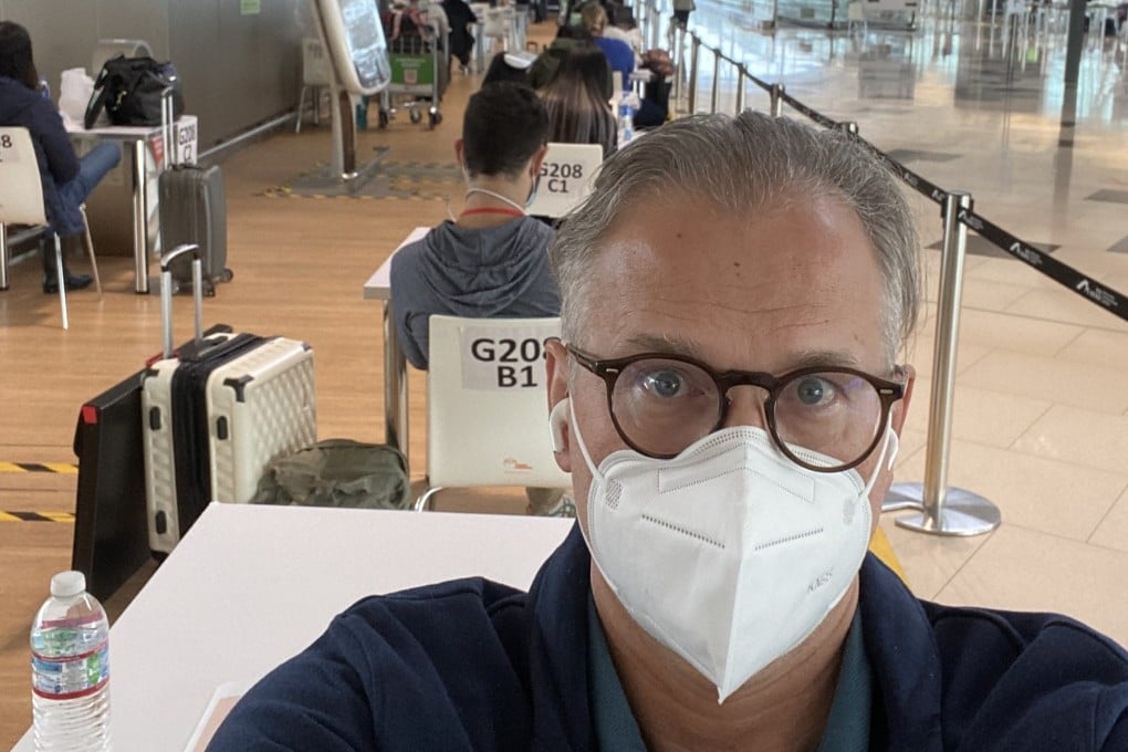 Post managing editor Brian Rhoads waits for the results of his Covid-19 test after arriving at Hong Kong International Airport on Thursday. Photo: Brian Rhoads