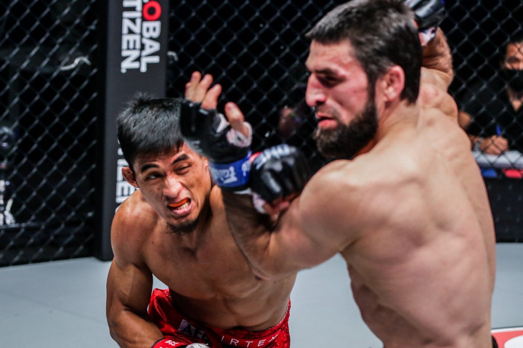 Stephen Loman lands a left on Yusup Saadulaev. Photos: Dux Carvajal/ONE Championship