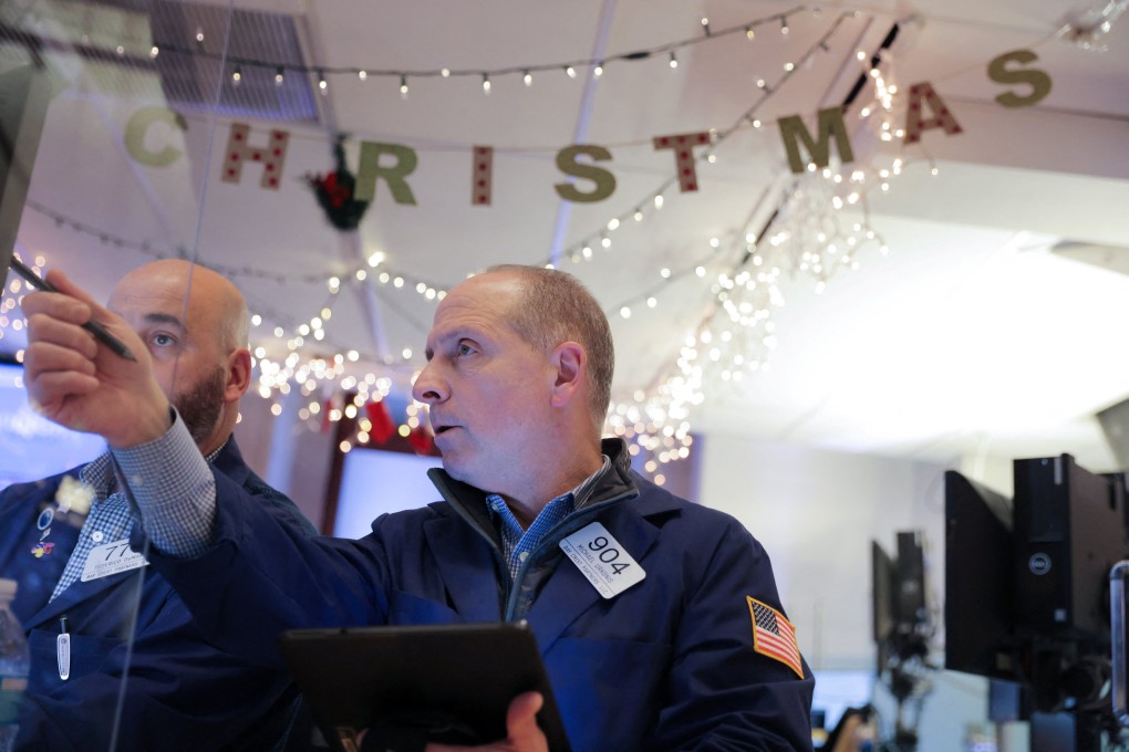 Traders work at the New York Stock Exchange in Manhattan on December 17, 2021. China’s securities regulator and American authorities have initiated talks on the audit inspection of US-listed Chinese companies amid the potential delisting of these firms. Photo: Reuters