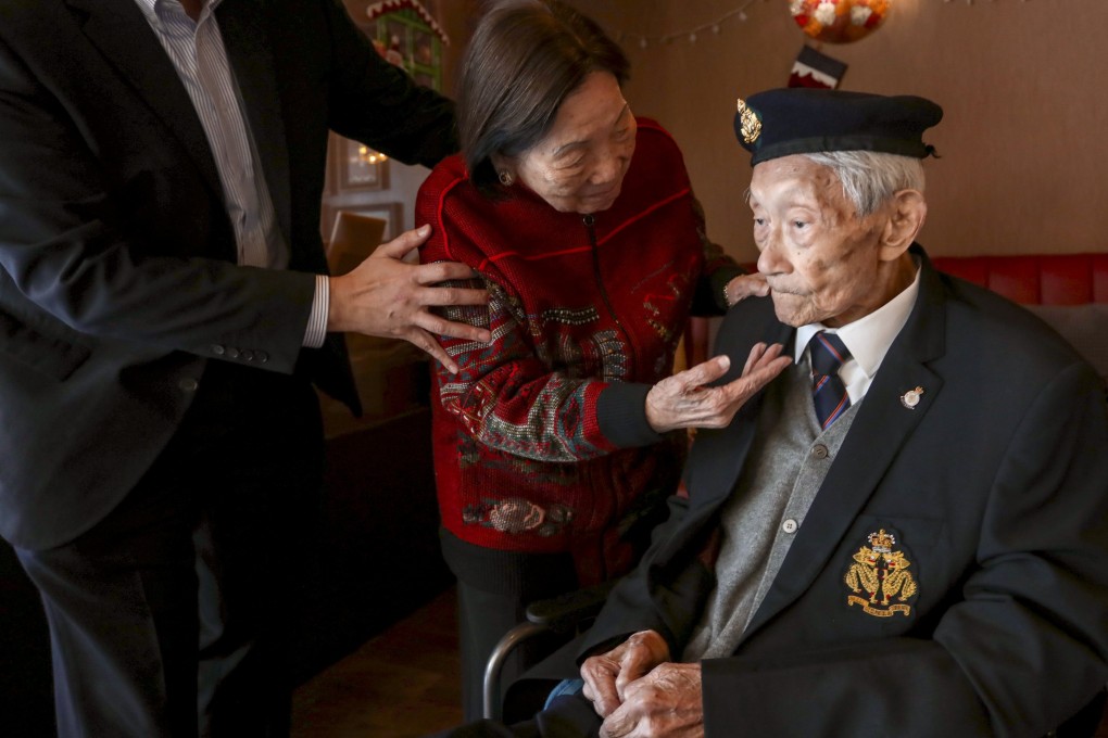 Yeung Ming-hon, 98, one of two remaining survivors of the Battle of Hong Kong, with his  his 92-year-old wife Yeung Yu Yee-fan at the Chinese Recreation Club in Tai Hang. Photo: Jonathan Wong
