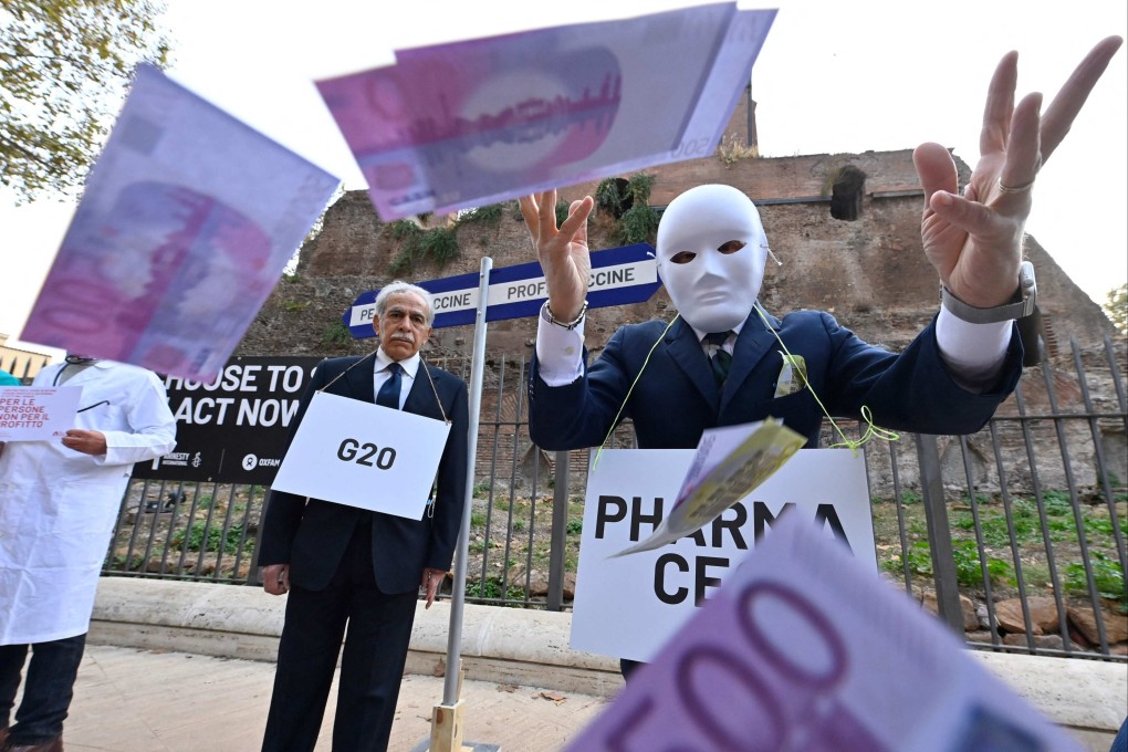 Activists from Amnesty international, Emergency and Oxfam stage a flash mob demonstration to denounce global vaccine inequalities, on October 29 in Rome, on the eve of the G20 World Leaders Summit. Photo: AFP