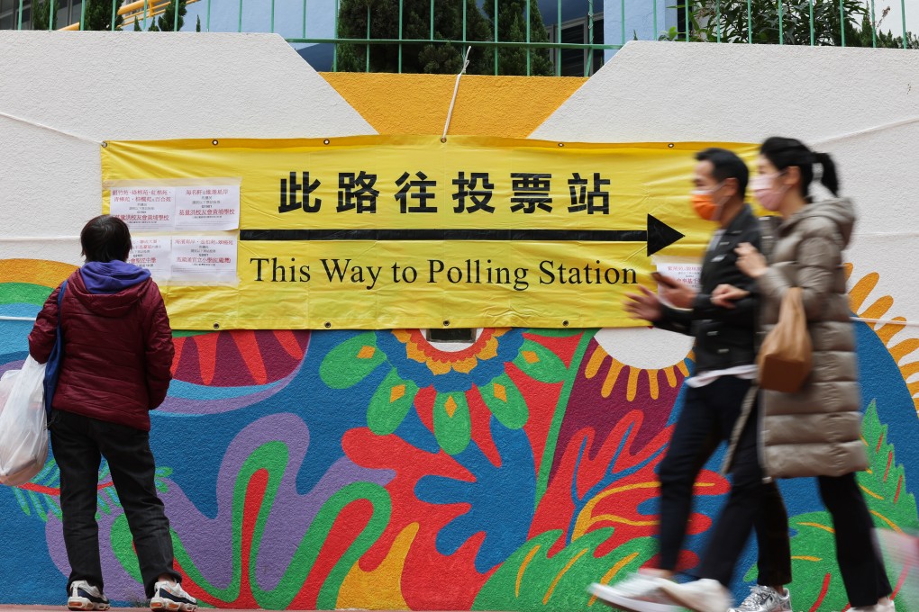 A polling station banner steers voters in Whampoa. Photo: Felix Wong