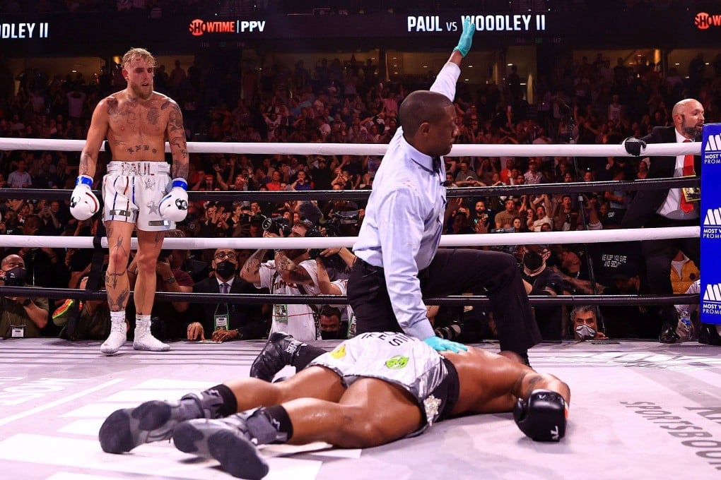 Jake Paul reacts to knocking out Tyron Woddley in the sixth round during in Tampa, Florida.Photo: Mike Ehrmann/Getty Images/AFP