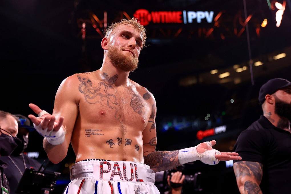 Jake Paul reacts to knocking out Tyron Woddley in the sixth round during a fight on December 18, 2021 in Tampa, Florida. Photo: Mike Ehrmann/Getty Images/AFP