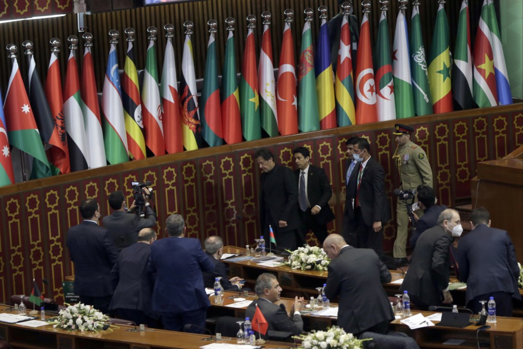 Pakistan Prime Minister Imran Khan, centre, at the 17th extraordinary session of Organisation of Islamic Cooperation (OIC) Council of Foreign Ministers, in Islamabad, Pakistan on Sunday. Photo: AP