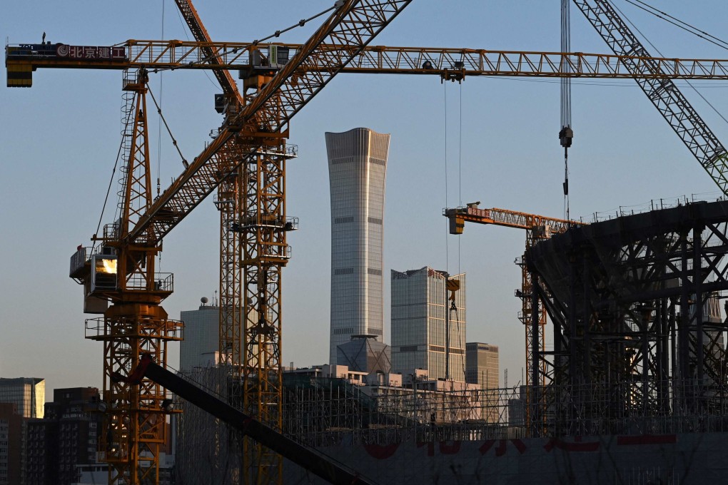A construction site in Beijing. The People’s Bank of China and the China Banking and Insurance Regulatory Commission are encouraging banks to provide loan services for the acquisition of quality property projects by quality developers. Photo: AFP