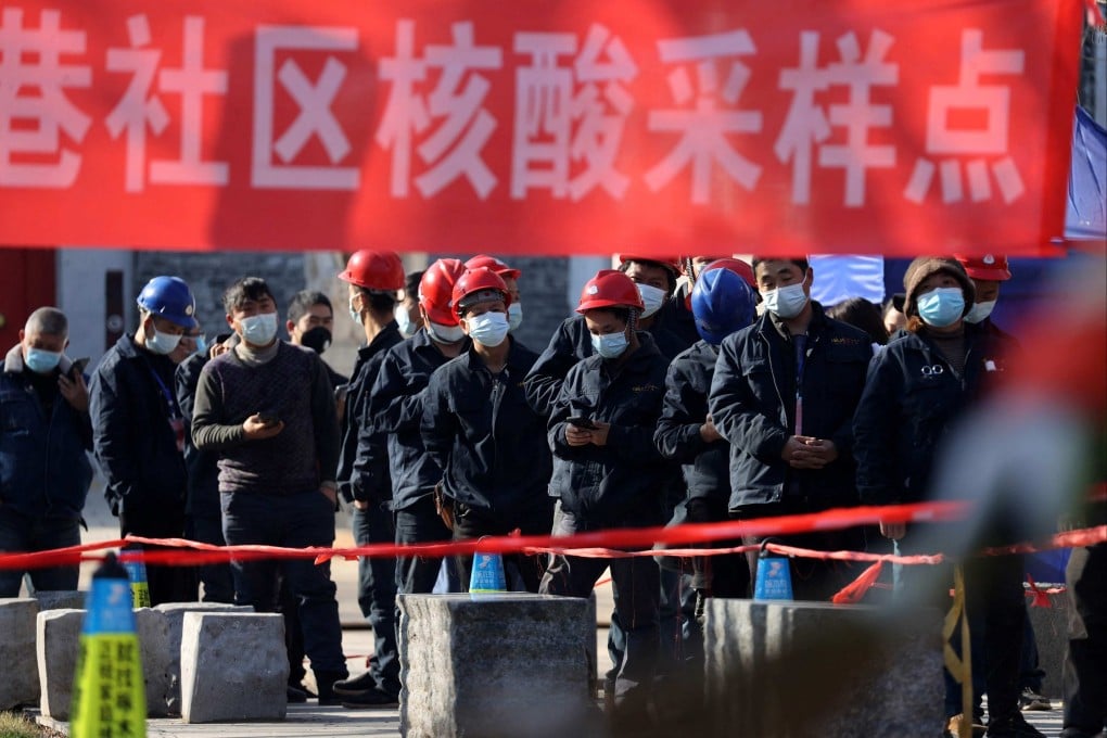 Construction workers line up for Covid-19 tests in Xian, in China’s northwestern Shaanxi province. Photo: AFP