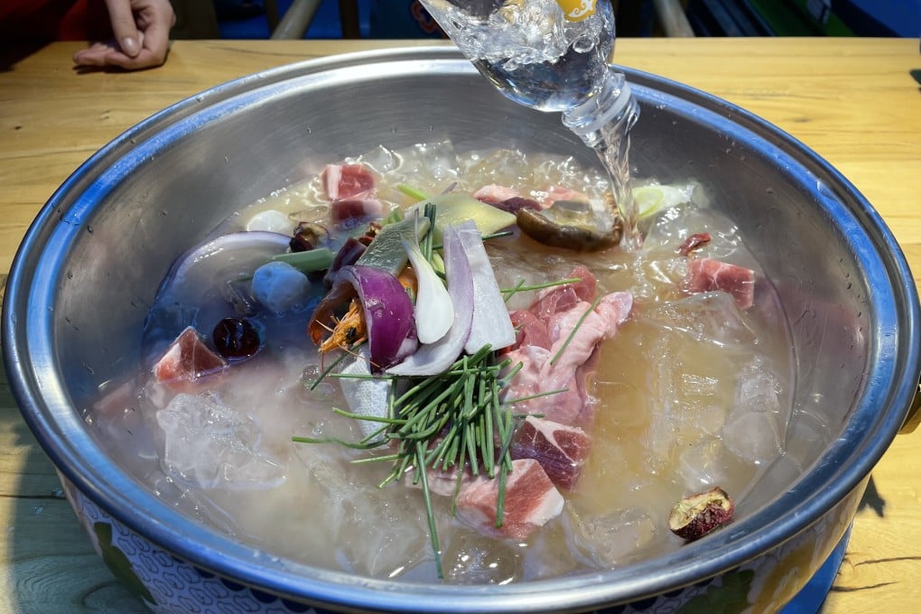 Lamb hotpot is a popular dish in northern China during the winter months. At Caoyuan Wangshi, a Mongolian specialist lamb hotpot chain, diced lamb cubes are served with ice to keep the meat fresh. Photo: Elaine Yau