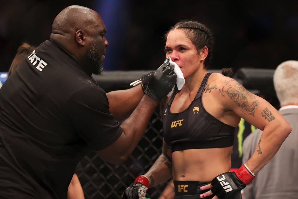 Amanda Nunes of Brazil is attended to following her loss to Julianna Pena at UFC 269. Photo: Carmen Mandato/Getty Images/AFP