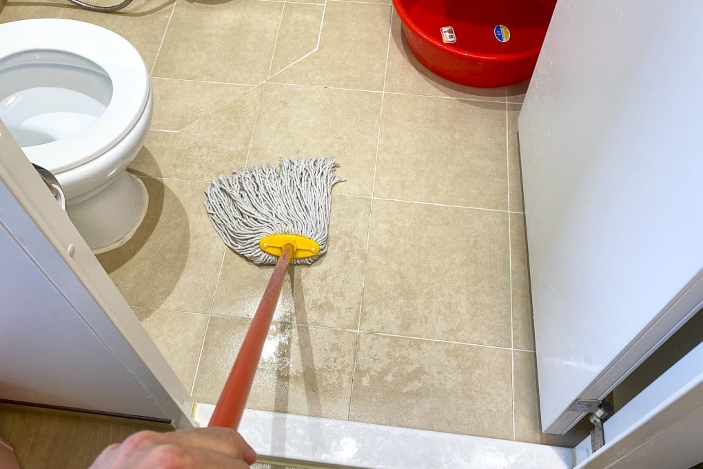 Our managing editor mops his bathroom for the seventh (OK, third) time as he eyes his looming departure. Photo: Brian Rhoads