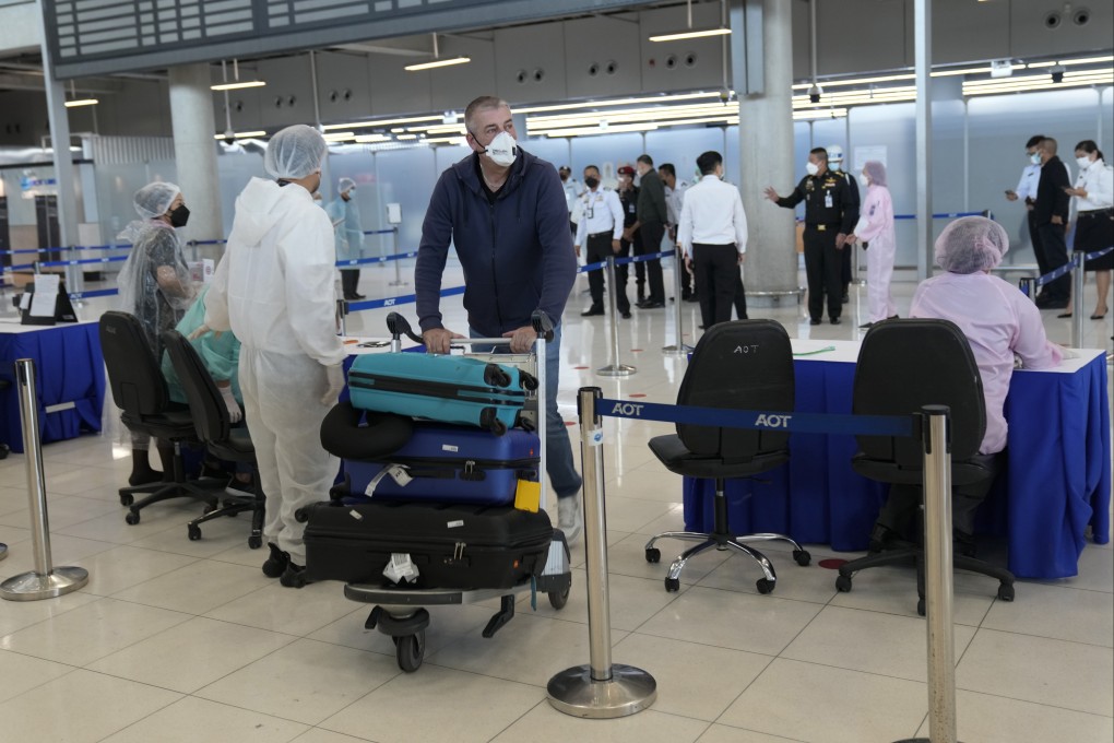 A tourist arrives at Suvarnabhumi International Airport in Bangkok, Thailand. Photo: AP