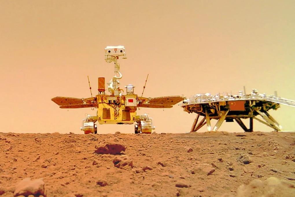The Zhu Rong Mars Rover, pictured next to the landing platform, on the surface of the red planet.
Photo: EPA-EFE