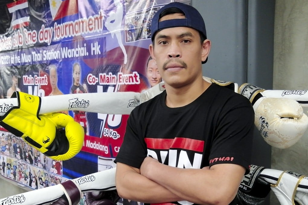 Muay Thai trainer Thep is giving domestic helpers the chance to train, socialise and shrug off the stresses that have kept many away from their families for more than two years. Photo: SCMP