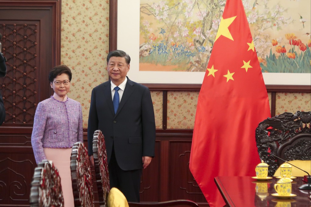 Hong Kong Chief Executive Carrie Lam with Chinese President Xi Jinping. Photo: Pool