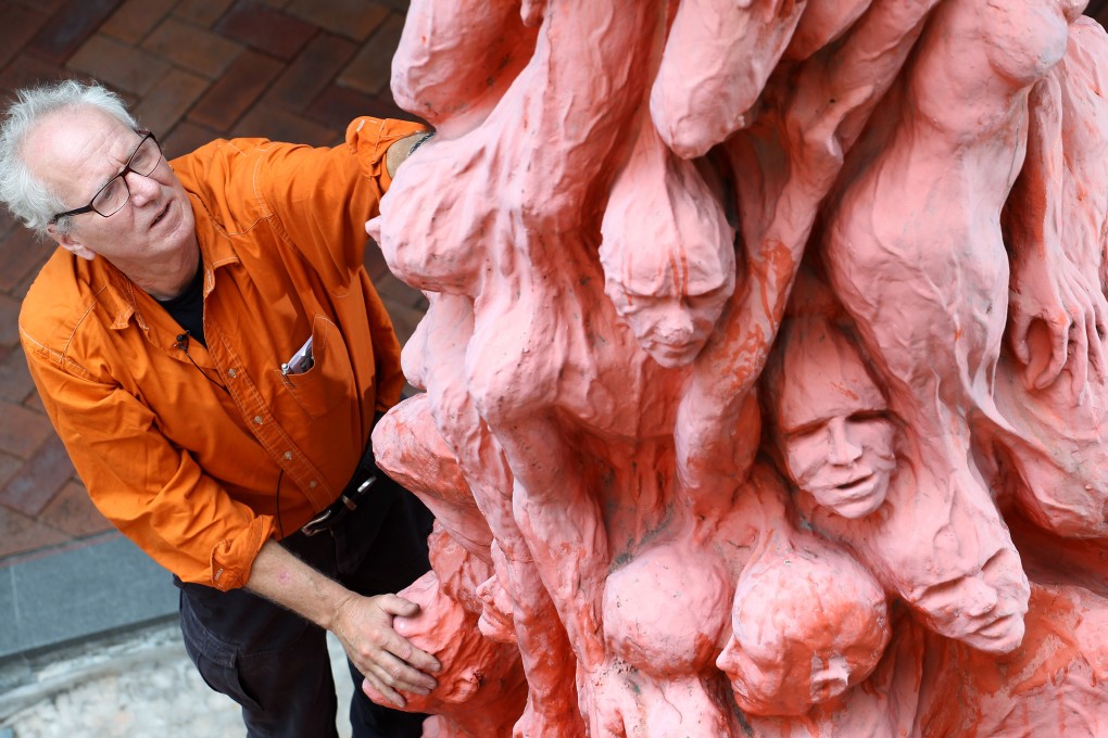 Danish sculptor Jens Galschiøt at the Pillar of Shame at the University of Hong Kong back in 2013. Photo: SCMP