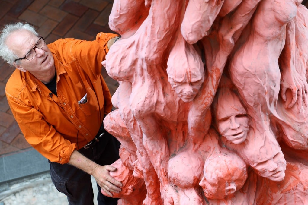 Danish sculptor Jens Galschiøt at the Pillar of Shame at the University of Hong Kong back in 2013. Photo: SCMP