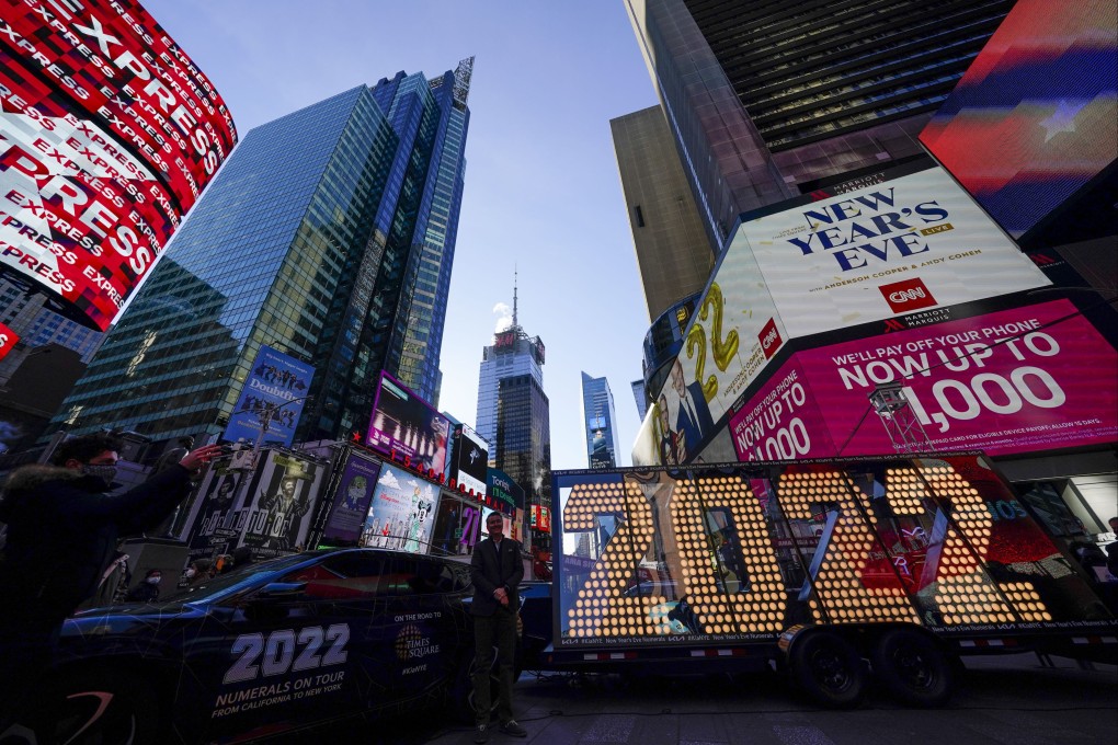 The 2022 sign that will be lit on top of a building on New Year’s Eve is displayed in Times Square, New York, on Monday. Photo: AP