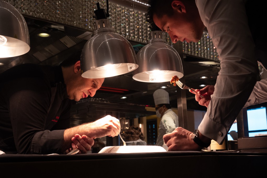 Chef Guillaume Galliot (left) of Caprice works meticulously on his latest creation. The adaptability of Hong Kong chefs during Covid-19 will be celebrated in new Discovery Channel show Kung Food! Hong Kong’s Grandmasters of Cuisine. Photo: Discovery
