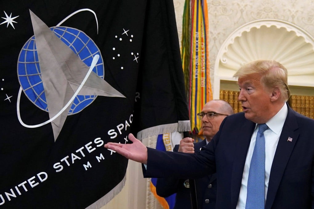 Donald Trump signed the law establishing space force two years ago. Photo: Reuters