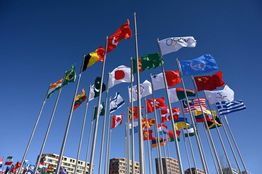 Flags fly at the Beijing 2022 Winter Olympic Games village. Photo: AFP