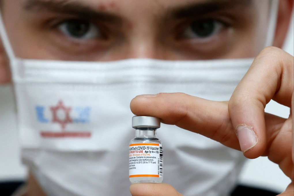 A nurse holds a vial of the Pfizer-BioNtech coronavirus vaccine for children in the Israeli town of Ramat Gan near Tel Aviv on Thursday. Photo: AFP