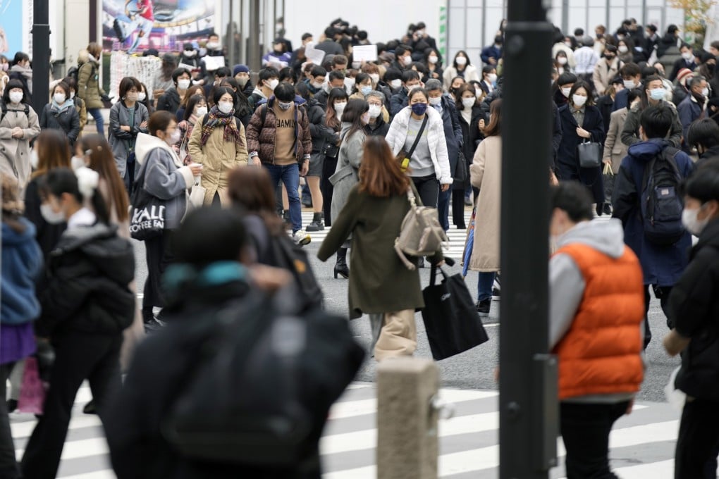 People use a pedestrian crossing in Tokyo’s Shibuya district earlier this month. Photo: AP