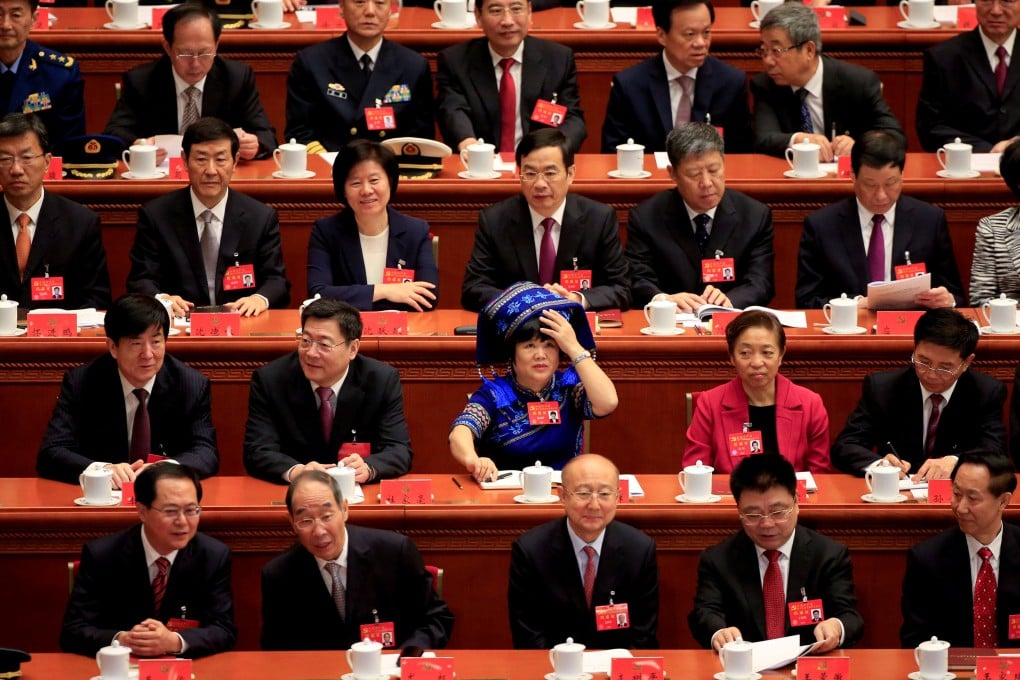 Delegates chat during the 19th Party Congress in Beijing on October 18, 2017. Women make up just 28 per cent of the Party’s 91 million members. Photo: Reuters