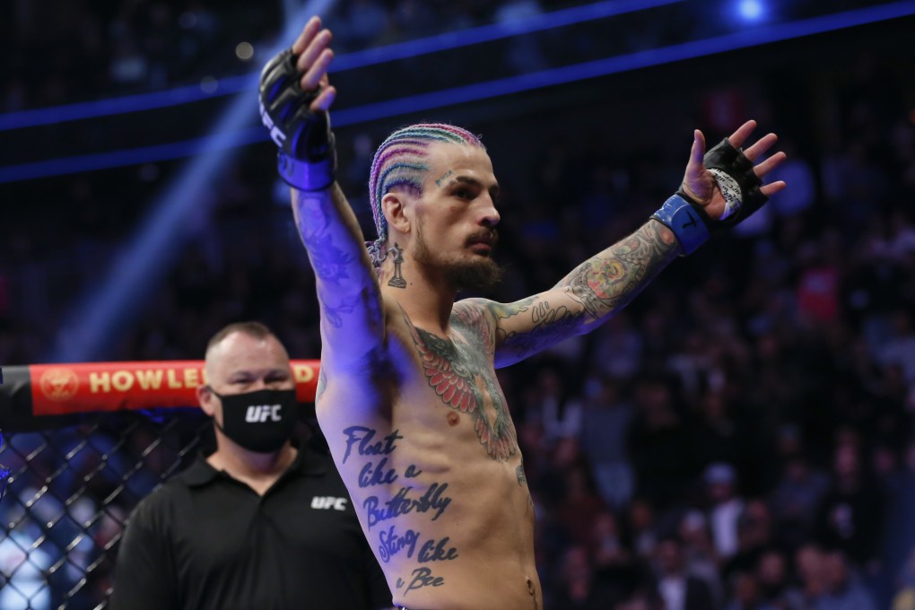 Sean O’Malley prepares to enter the Octagon before his bantamweight bout against Raulian Paiva at UFC 269. Photo: AP Photo/Chase Stevens