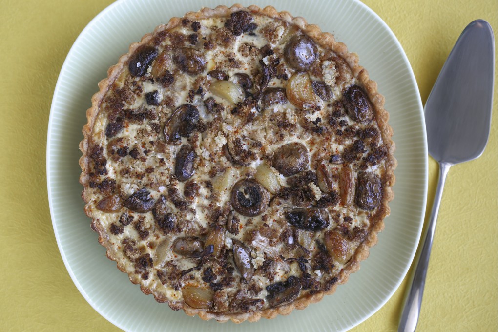 Roasted cauliflower, mushroom and garlic tart with piment d’Espelette butter. Photo: Jonathan Wong
