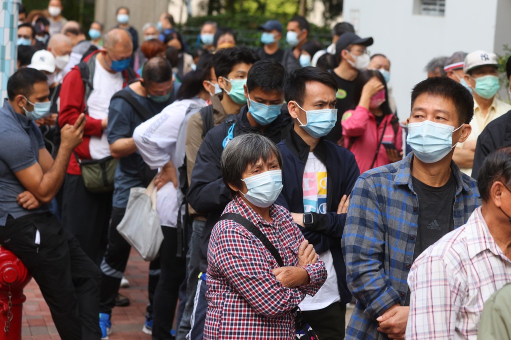 People queue up for Sinovac shots outside a community vaccination centre in Jordan last month. Photo: Dickson Lee