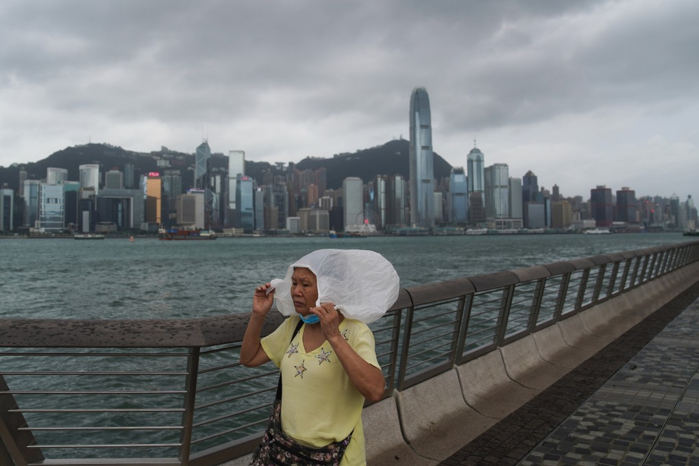 Hong Kong during last year’s Typhoon Lionrock. Banks will need to get more insurance cover for flooding and other business interruptions to protect themselves, an analyst says. Photo: Sam Tsang