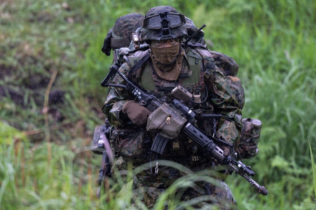 A Japanese soldier trains during a joint military drill with French and US forces in May. Photo: Reuters