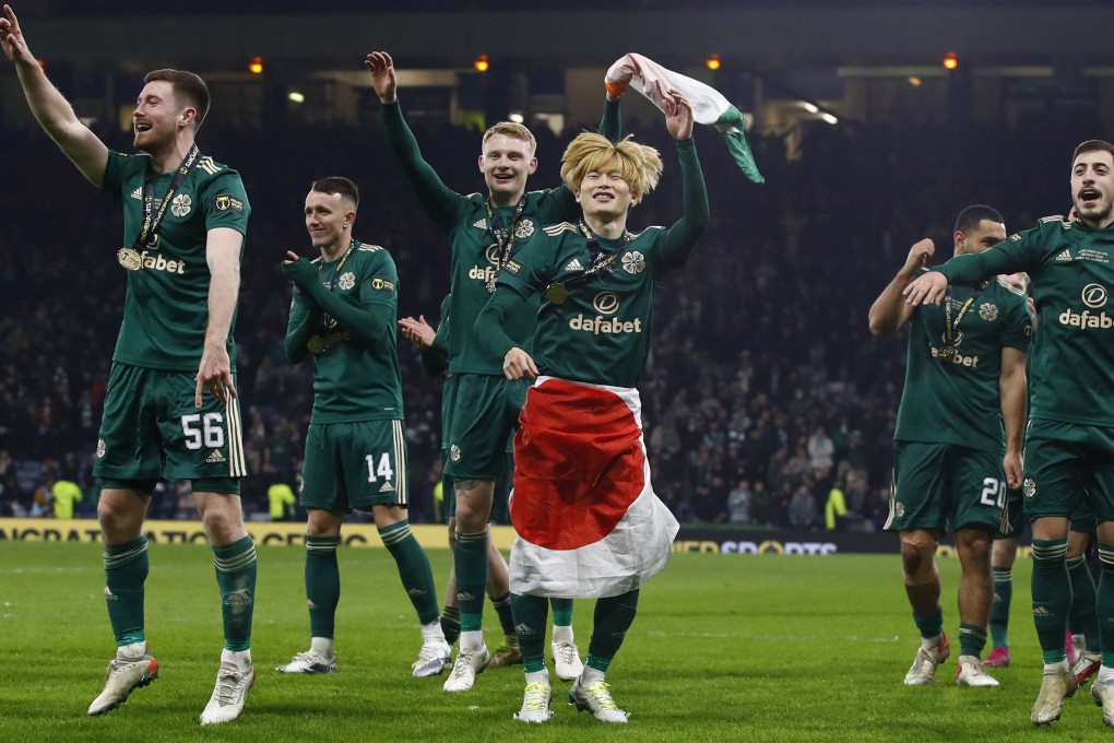 Celtic player Kyogo Furuhashi of Japan celebrates with his teammates after winning the Scottish League Cup final against hibernian at Hampden Park in Glasgow. Photo: Reuters