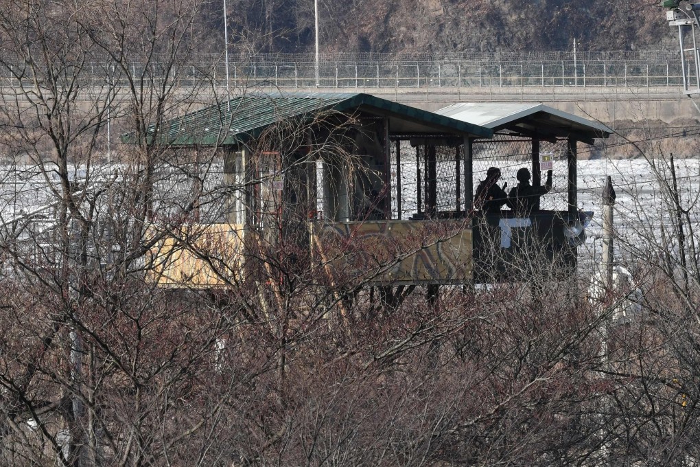 South Korean soldiers stand guard at the demilitarised zone dividing the two Koreas in Paju on Saturday. Photo: AFP