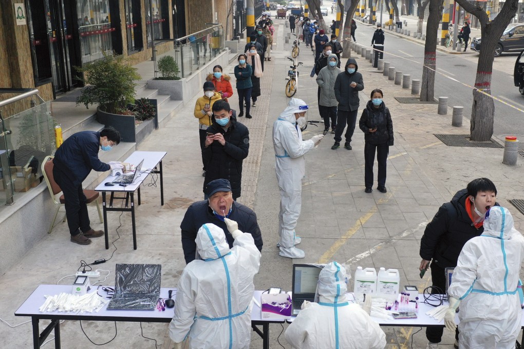 Residents queue for Covid-19 tests in Xian, which has been under a strict lockdown for nearly a fortnight. Photo: AP