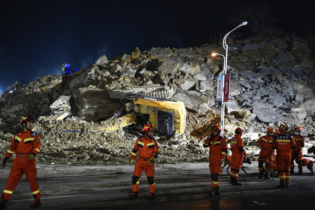 Rescuers worked through the night under floodlights to find survivors. Photo: AP