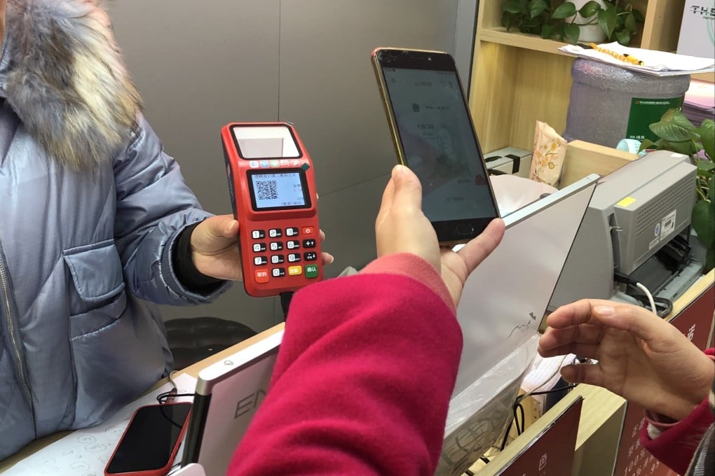 A Suzhou resident uses the digital yuan as part of a trial in select cities across China. Photo: Orange Wang