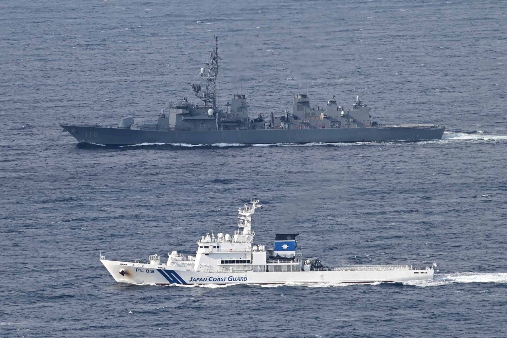 The Japan coastguard conducts an exercise with the Japan Maritime Self-Defence Force on December 22 in the east of Izu-Oshima Island.