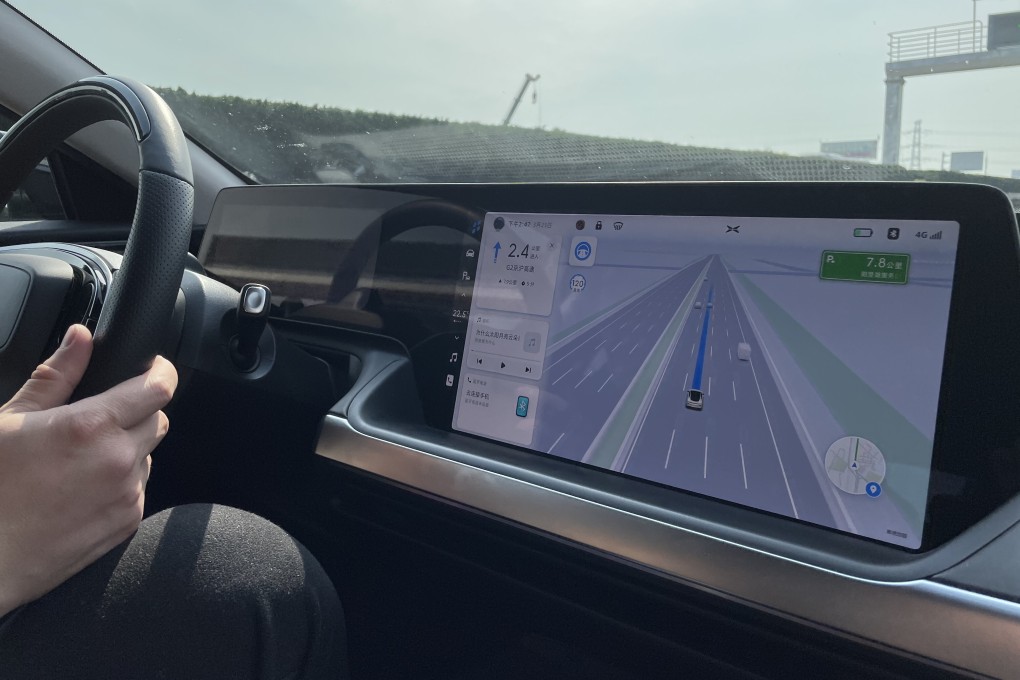 A Xpeng smart EV uses
its driver-assist system on the Beijing-Shanghai Expressway. Photo: Daniel Ren