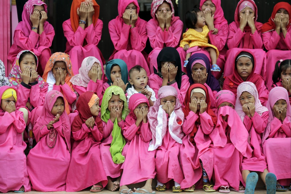 Filipino Muslim girls may still marry under new law, but only for one more year. Photo: EPA