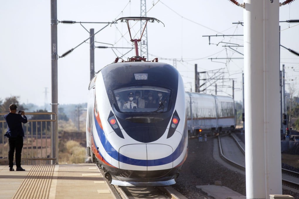 A train pulls into a station in Vientiane in Laos. The opening of a US$6 billion railway between Vientiane and Boten on the Chinese border has created a continuous rail link between Singapore and Portugal, believed to be the longest in the world. Photo: Getty Images