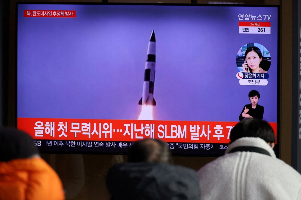 People in Seoul on Wednesday watch a screen showing file footage of a North Korean missile launch. Photo: Reuters