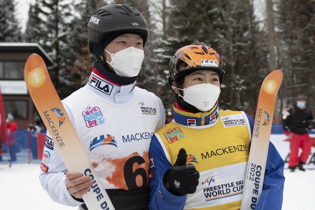 Sun Jiaxu (left) and Xu Mengtao celebrate their victories at the World Cup freestyle skiing event in Quebec. Photo: AP