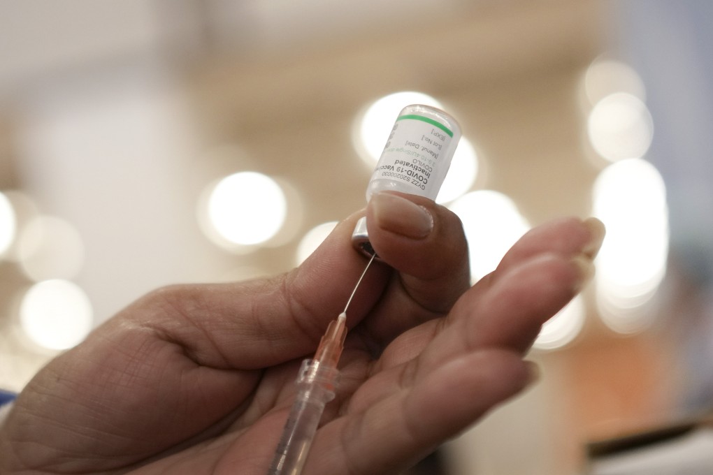 A health care worker prepares a dose of the Sinopharm Covid-19 vaccine. Photo: AP