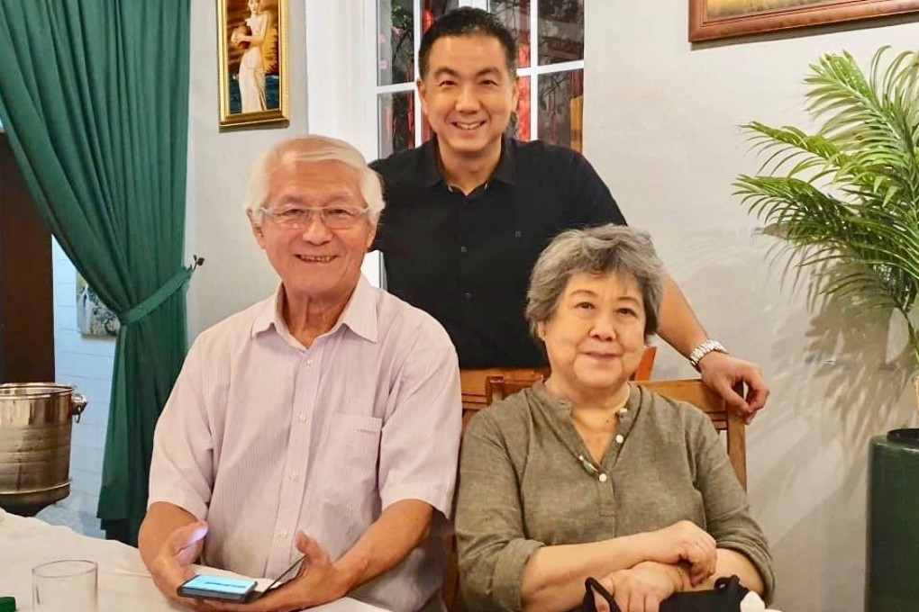 Lim Kok Cheong (left) with his wife Jun Chua and son Ee Young. Photo: Amy Chew