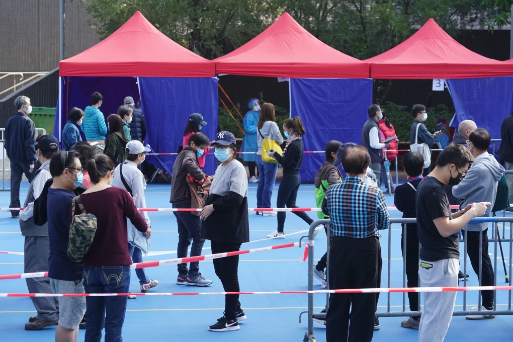 People queue up for Covid-19 testing in Victoria Park, Causeway Bay on Saturday. Photo: Felix Wong