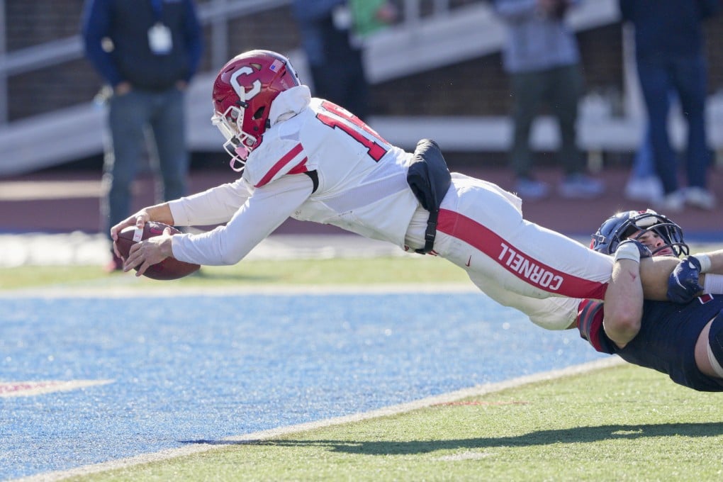 Cornell Big Red quarterback Jameson Wang (16) dives for a touchdown. Wang could be one of the first Chinese-American quarterbacks to play in the NFL. Photo: Getty Images