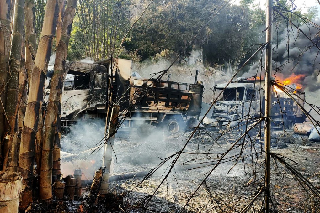 Smoke and flames billow from vehicles in Hpruso on December 24. Myanmar government troops rounded up and shot more than 30 villagers and set their bodies on fire, witnesses said. Photo: Karenni Nationalities Defence Force via AP